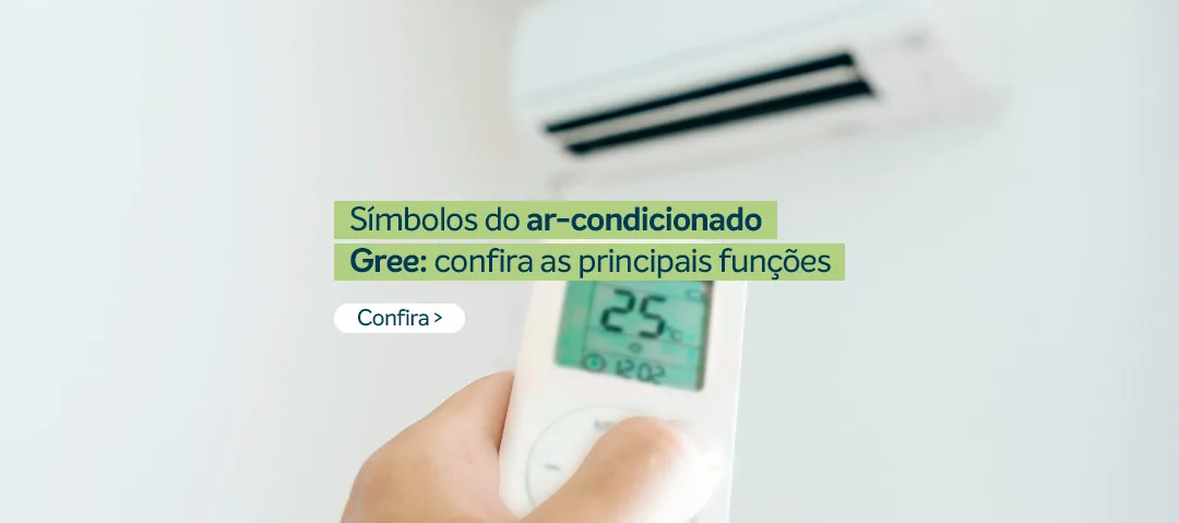 Pessoa com controle ar-condicionado Gree na mão