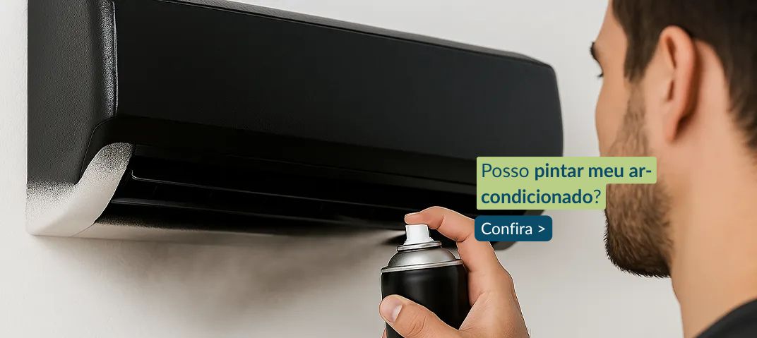 Homem pintando equipamento de ar-condicionado