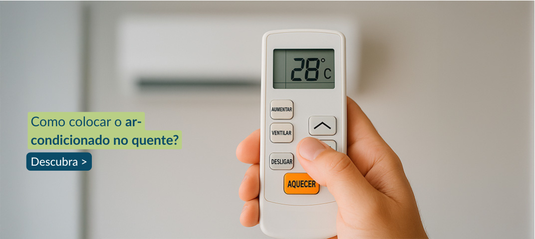 Mão segurando controle para colocar o ar-condicionado no quente