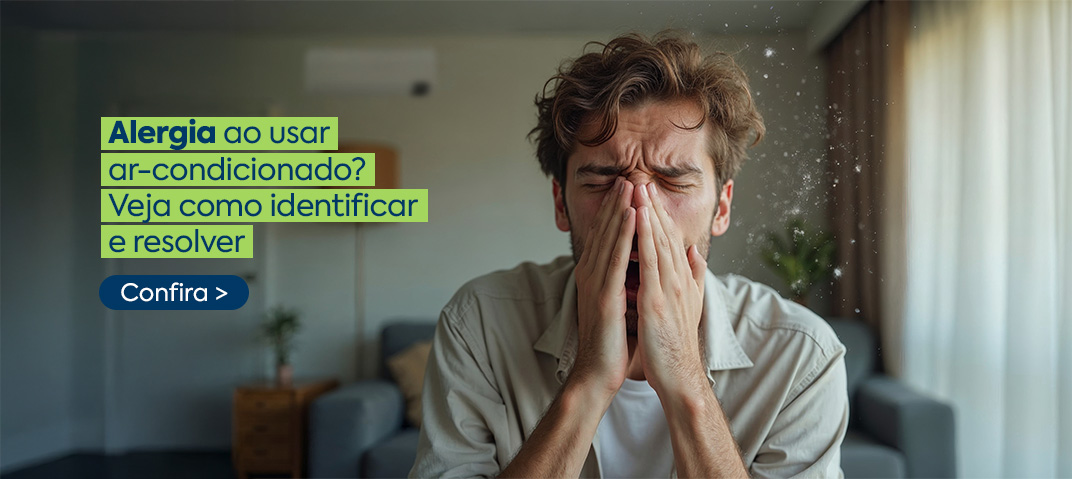 Homem espirrando com alergia ao ar-condicionado